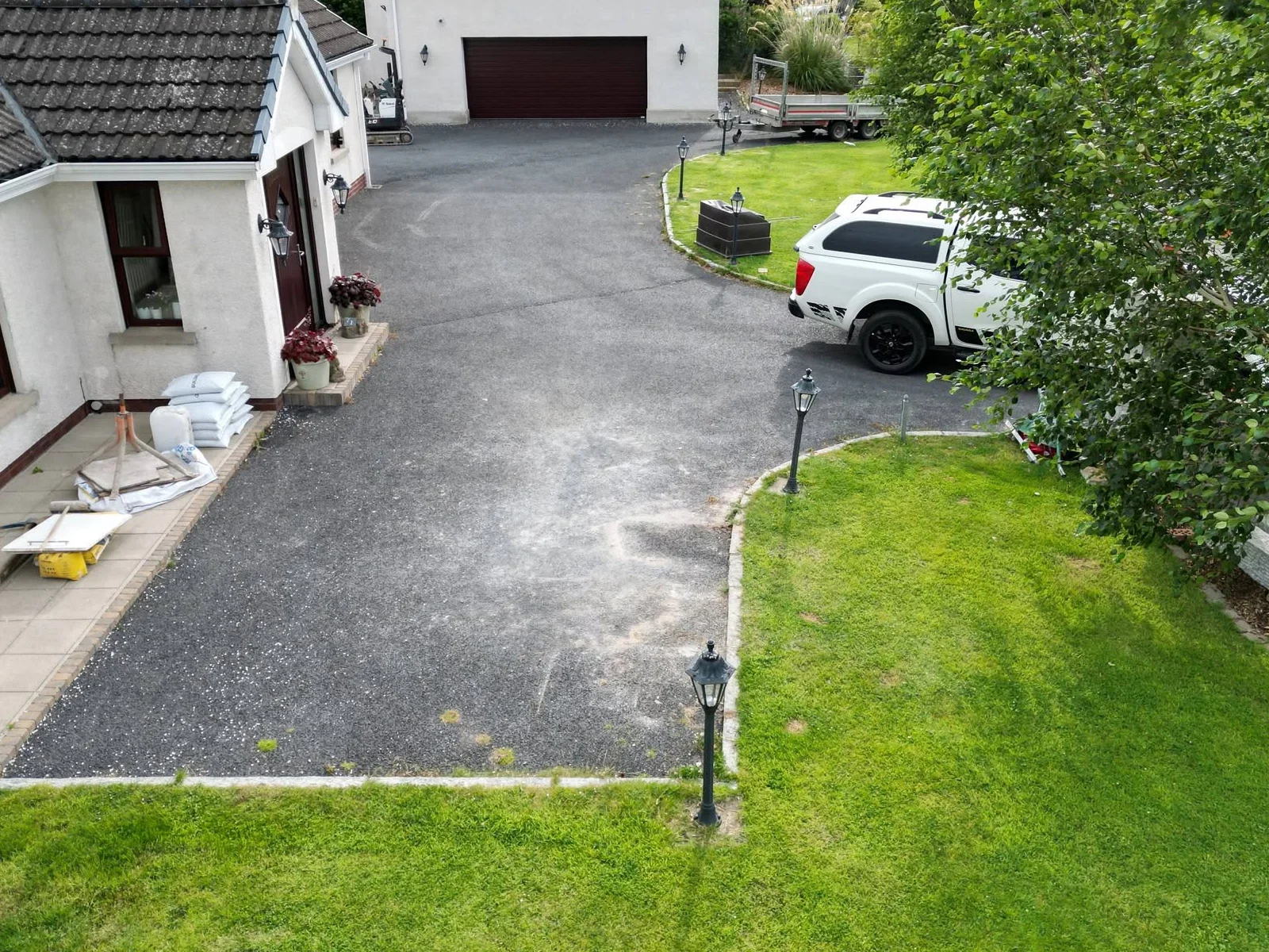 Driveway and lawn beside the house